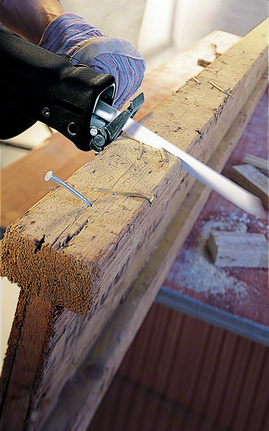 Reciprocating saw blade S 1222 VF Worker wearing safety equipment uses a reciprocating saw to cut through a wooden beam.
