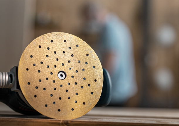 EXPERT C470 Sandpaper with 8 holes for Random Orbital Sanders 115 mm, G 40 5-pc Bosch sanding disc with multiple dust extraction holes.