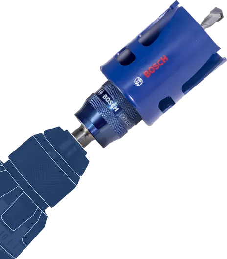Hole saw drill attachment connected to a power tool.