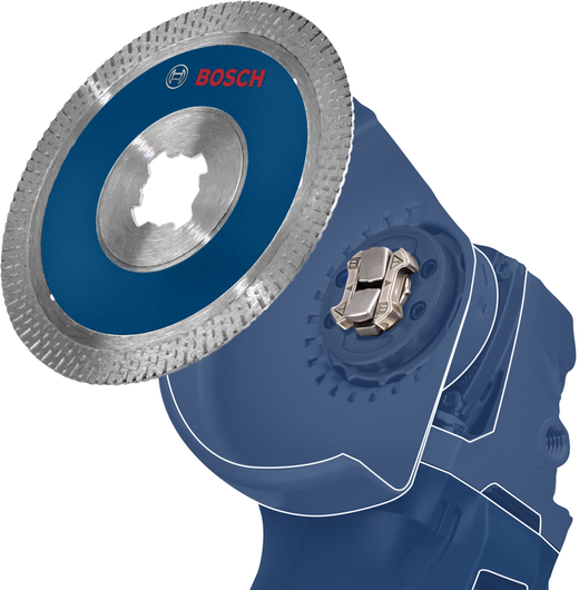Angle grinder with attached diamond saw blade shown in close-up for cutting applications.