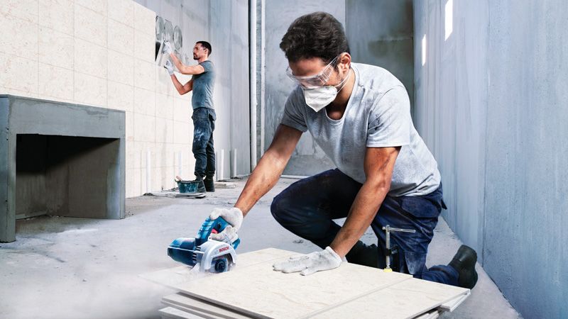 GDC 140 Bosch GDC 140 diamond tile cutter in use.
