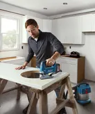 Man using cordless jigsaw.