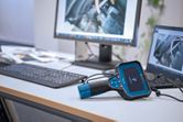 Inspection camera connected to a computer on an office desk displaying engine images.