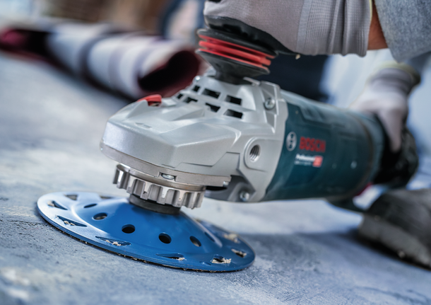 Bosch floor grinding cup wheel attached to angle grinder.