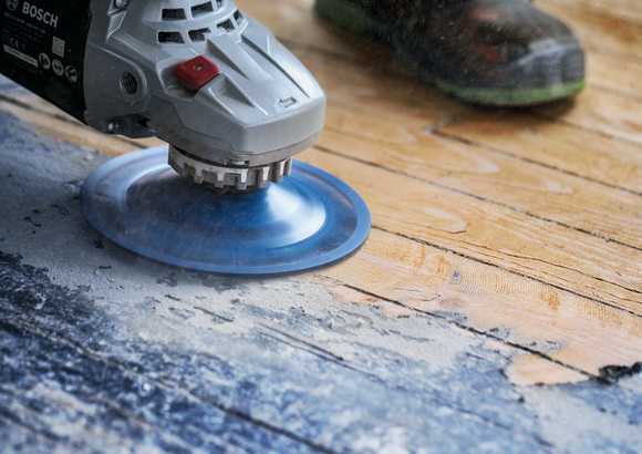 Bosch wood planer disc removing floor finish.