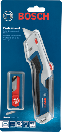 Utility knife and spare blades in plastic packaging on a blue background.