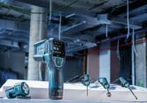 Thermo detector with probes measures temperature at a construction site.