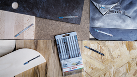 Jigsaw blades and packaging displayed on different wood, metal, and tile surfaces.