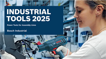 A woman uses a Bosch Industrial drill on an assembly line in a factory setting.